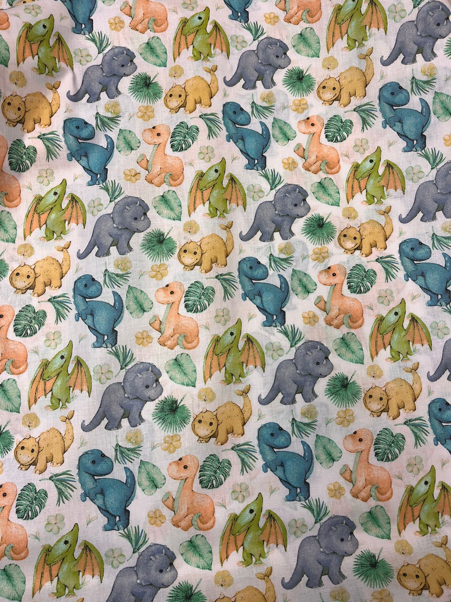 100% cotton fabric with dino print, 125 g/m² – available at Šarlotes audumi