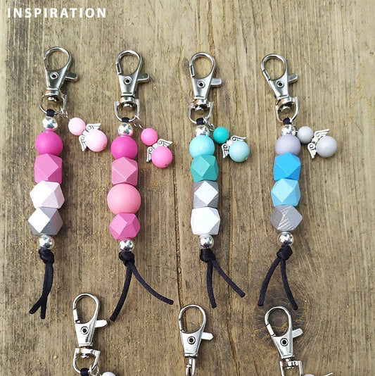 Image with diamond-shaped wooden beads | 15×20 mm | 10 pcs – available at Šarlotes audumi