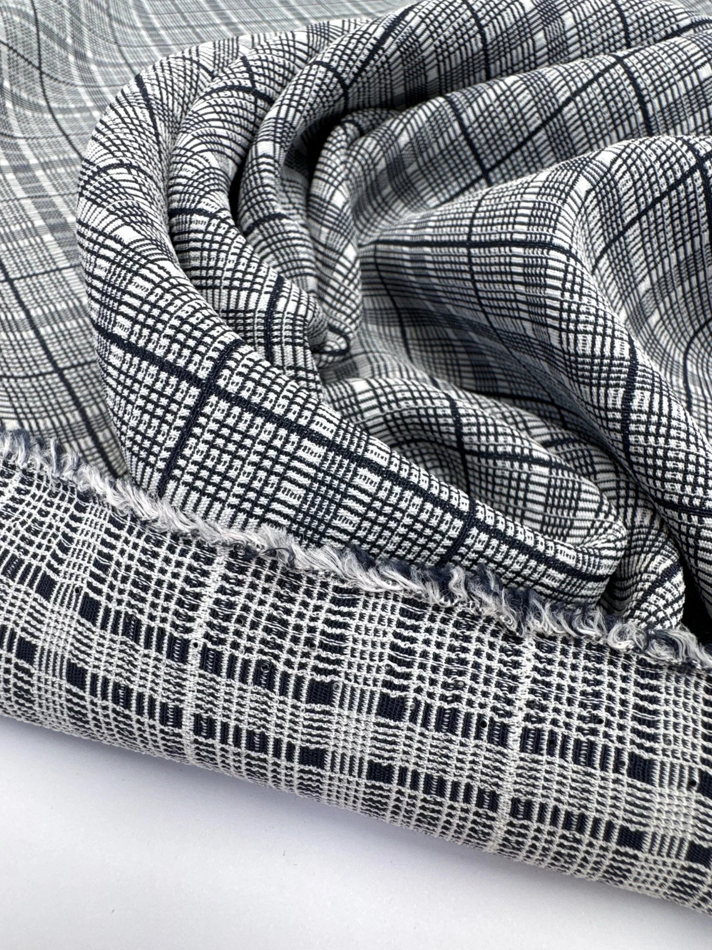 Image of Italian 100% cotton fabric in gray with a check pattern, medium-weight fabric for clothing, 195 g/m² – available at Šarlote Fabrics