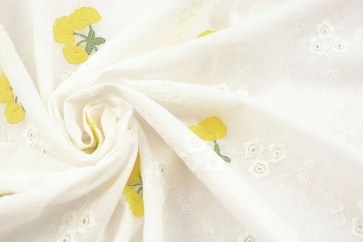 Embroidered cotton fabric - yellow flowers 110 g/m²