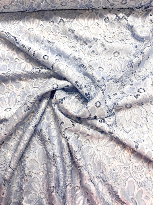Image with lace fabric - light blue flower 150 g/m² – available at Šarlotes audumi