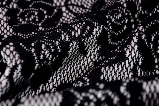 Image with lace fabric - black with white satin lining 155 g/m² – available at Šarlotes audumi