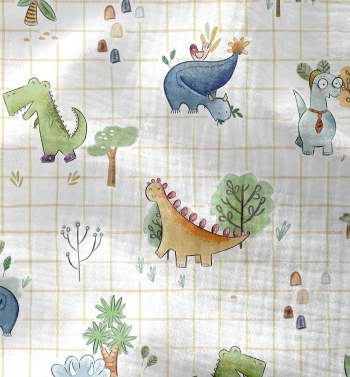 Image of Muslin - checkered dinosaurs 120 g/m² – available at Šarlotes audumi