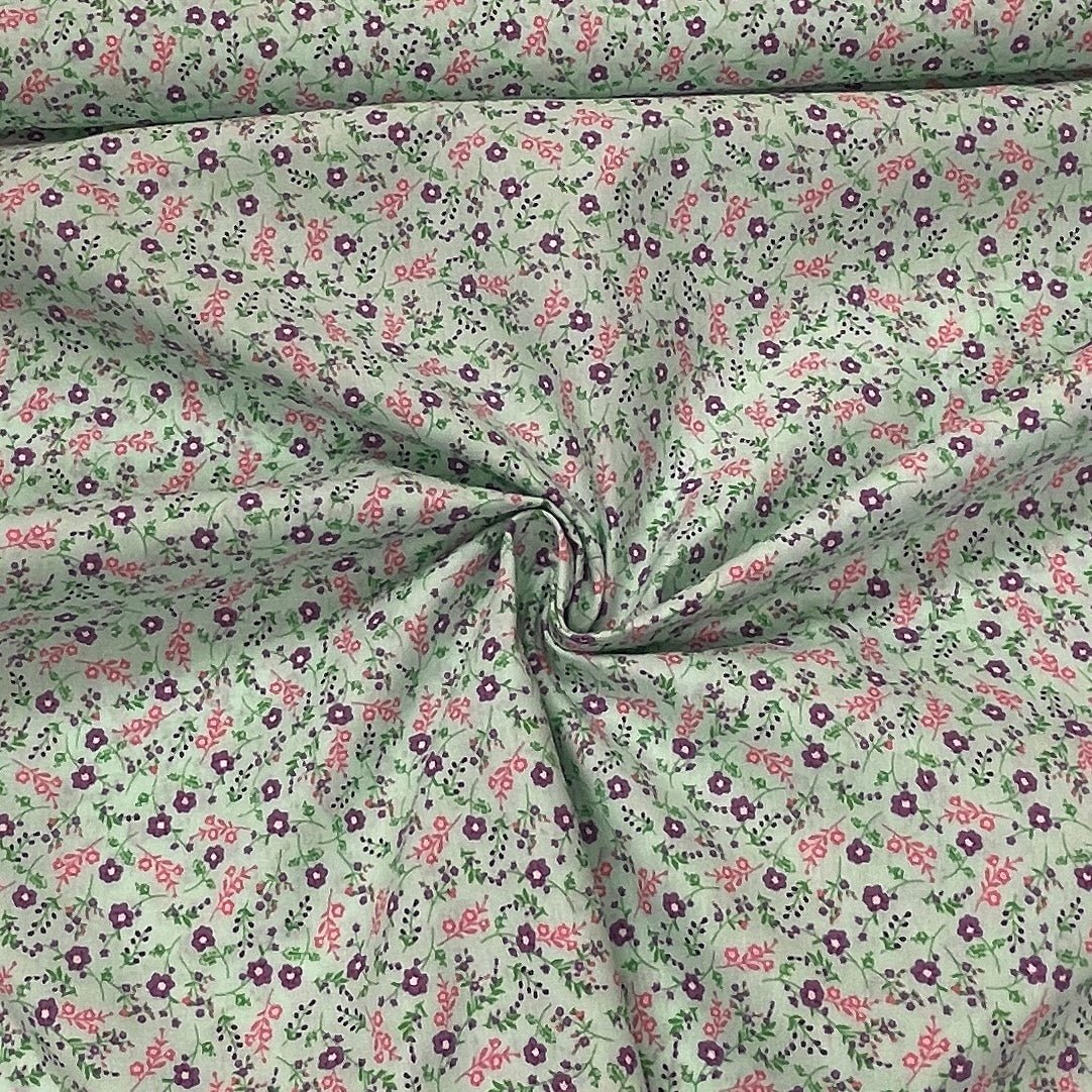 Premium 100% cotton fabric with flowers on a blue background 115 g/m²
