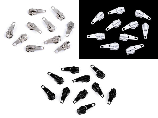 alt
Image with slider, boat-shaped zipper pull for size 5 spiral zipper|various shades – available at Šarlote Fabrics