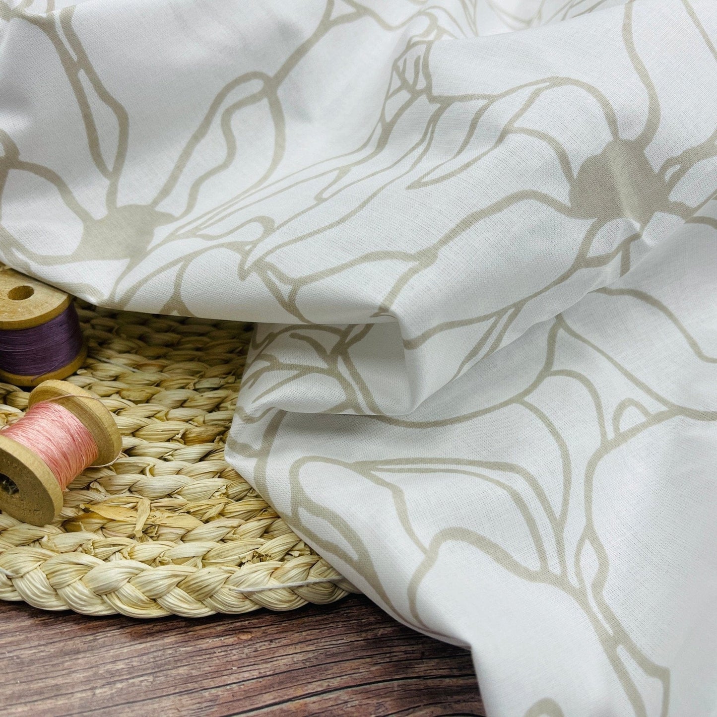 100% Cotton fabric - beige floral pattern on a white background 130 g/m²