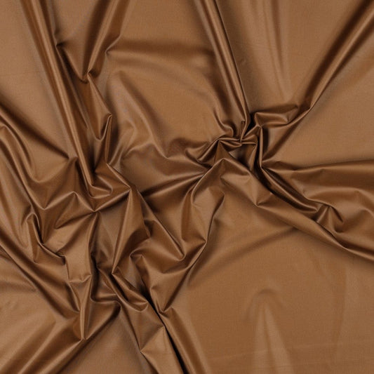 alt
Waterproof raincoat fabric-nut brown 70 g/m²
