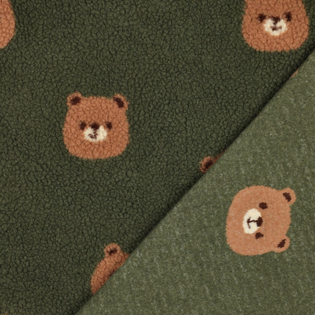 Miśki Teddy z polaru na ciemnozielonym tle