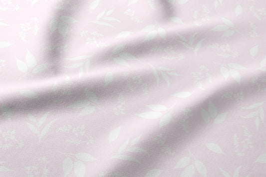Image with 100% cotton fabric - white leaves on a pink background 125 g/m² – available at Charlotte fabrics