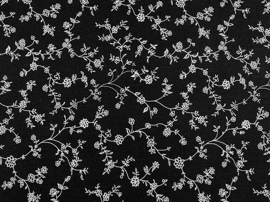 Image with 100% cotton fabric - white flowering vines on black 125 g/m² – available at Šarlotes Audumi