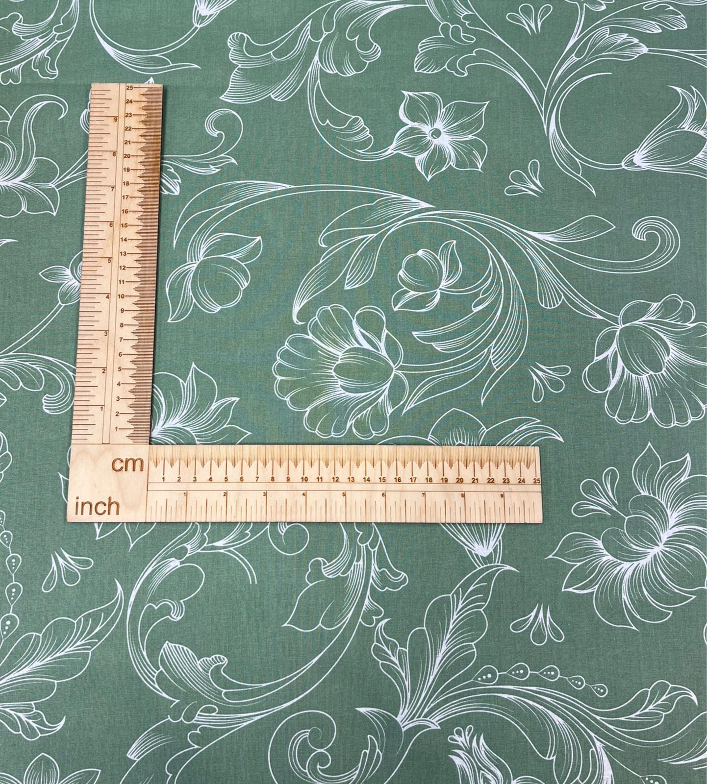 Image with 100% cotton fabric - white floral shadows on green 125 g/m² – available at Šarlotes audumi