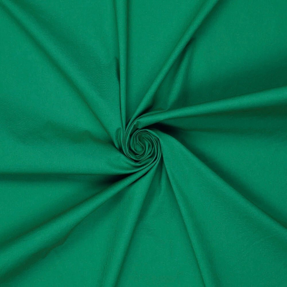 Image with 100% cotton fabric - brilliant green 125 g/m² – available at Šarlotes Audumi