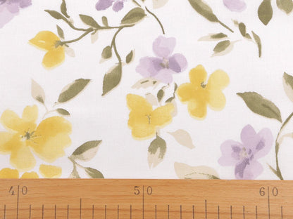 Image with 100% cotton fabric with yellow and lilac flowers – available online at Šarlotes audumi
