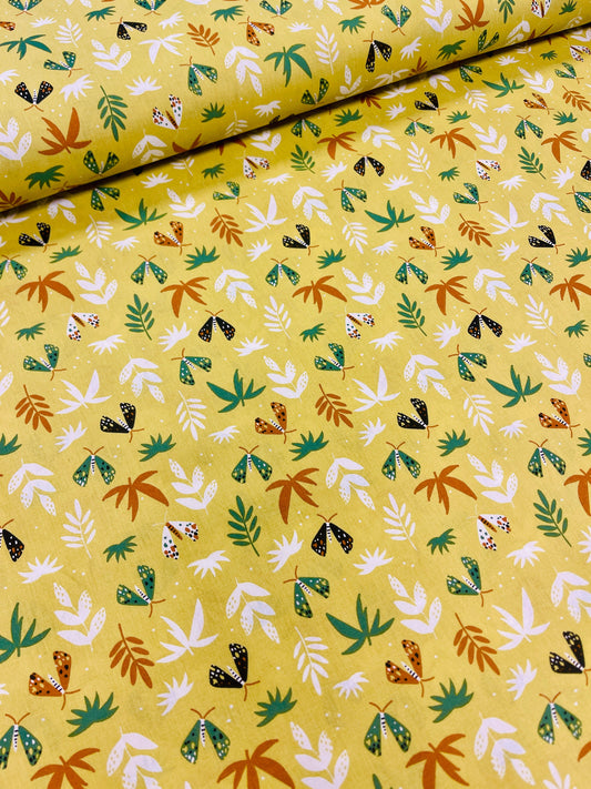 Image with 100% cotton fabric - leaves on a yellow-green background 125 g/m² – available at Šarlotes audumi
