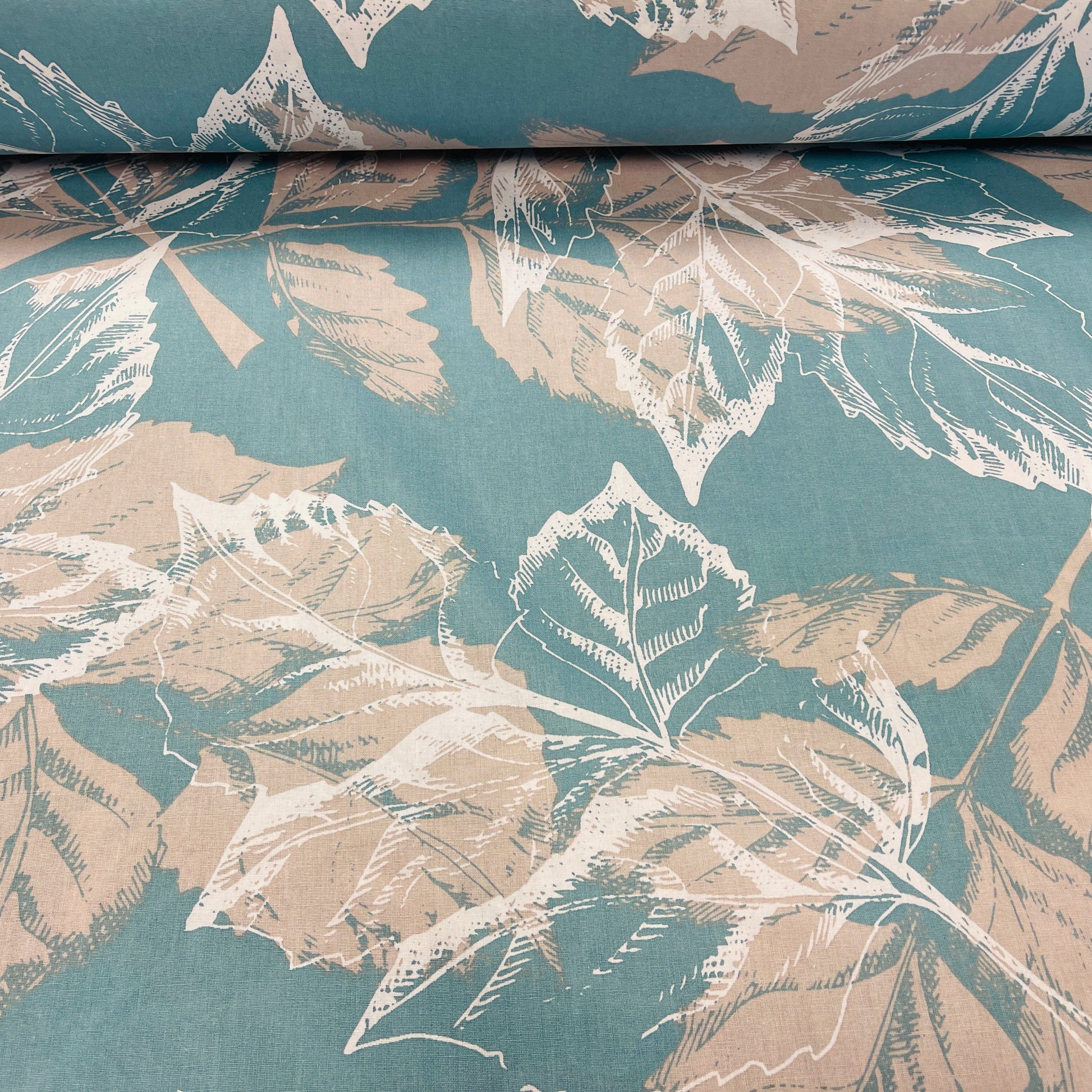 100% Cotton fabric - leaf motif on a turquoise background 220cm 146 g/m²
