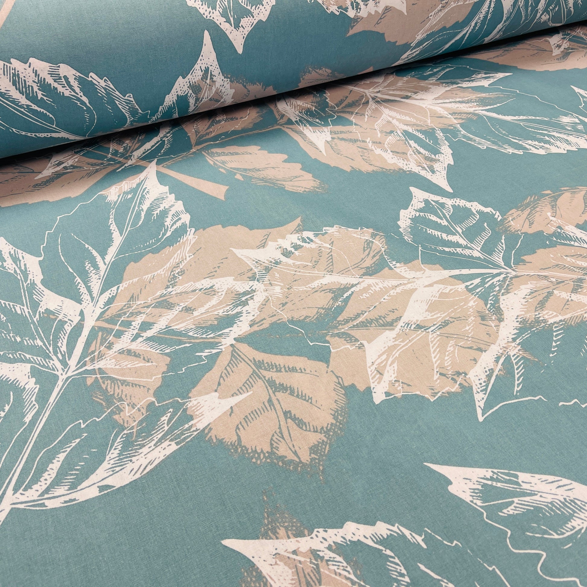100% cotton fabric - leaf motif on a turquoise background 220cm 146 g/m²