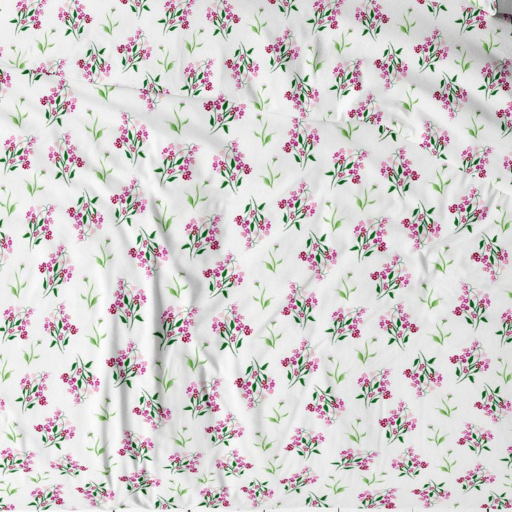 Image of 100% cotton fabric with pink forget-me-nots, 125 g/m² – available at Šarlotes audumi