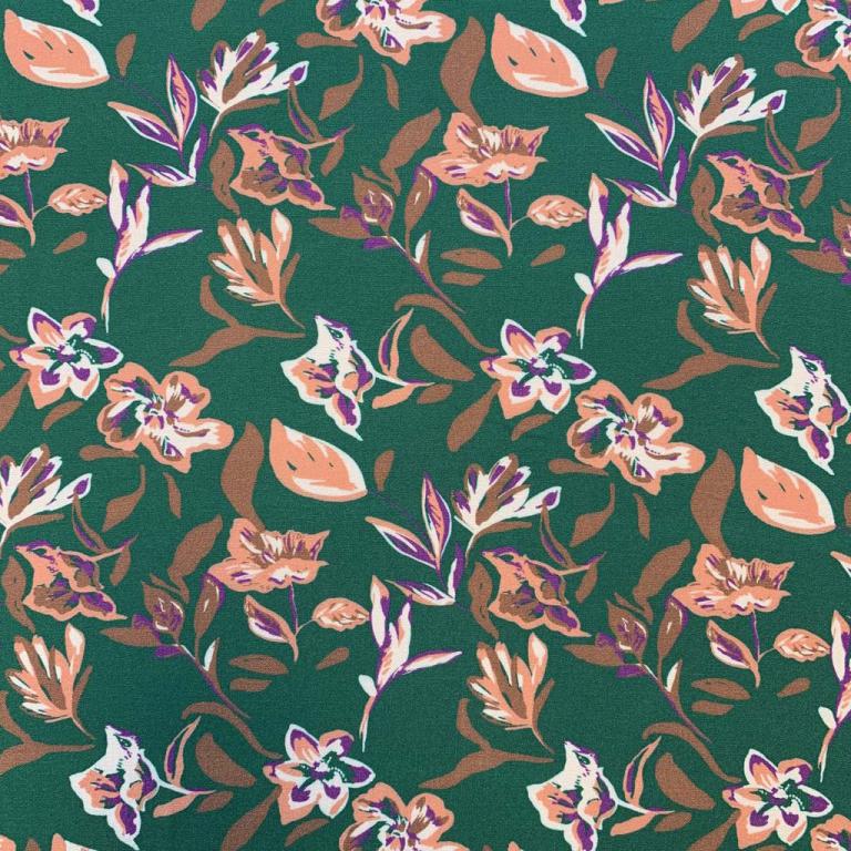 100% Viscose fabric - abstract floral pattern on a green background 125 g/m²