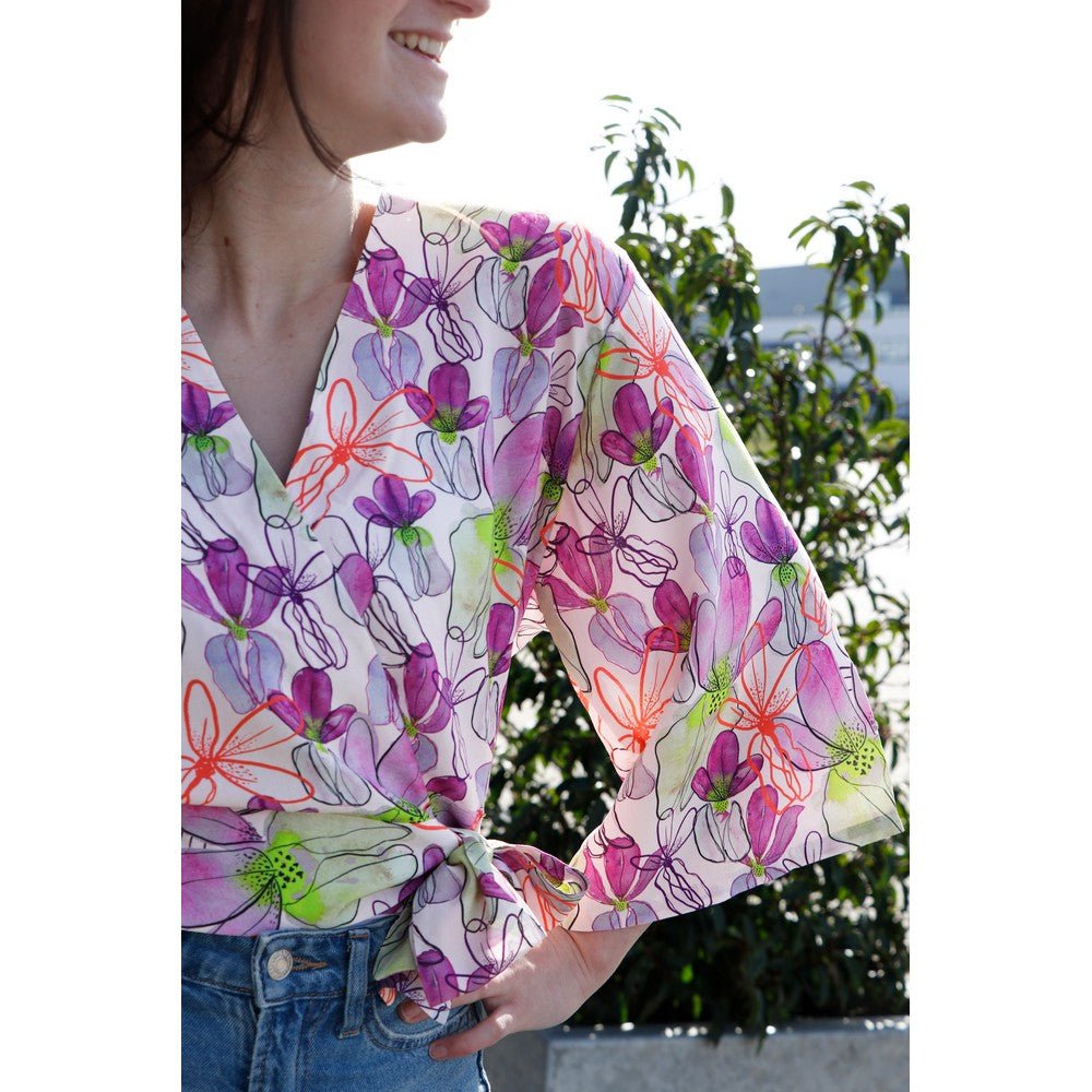 100% viscose fabric LENZING™ ECOVERO™ flowers on a lilac background 110 g/m²