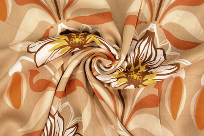 100% Viscose fabric - orange flowers 100 g/m²