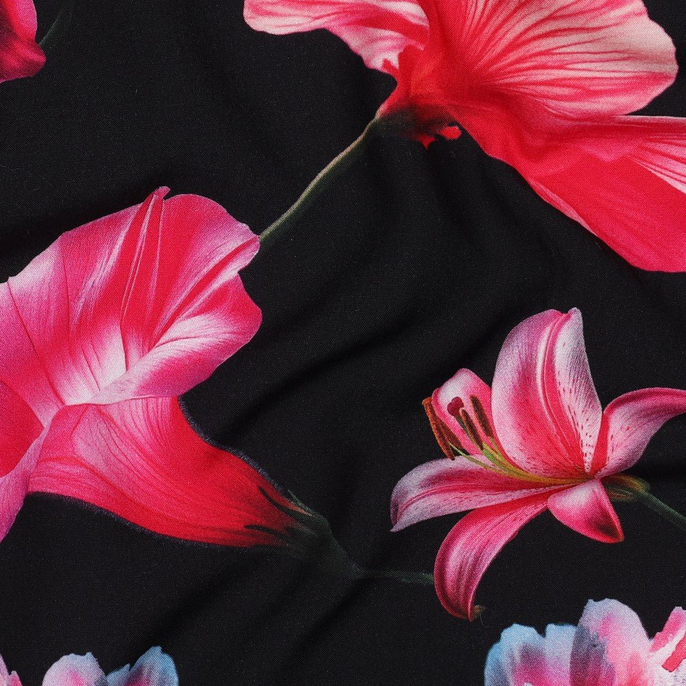 100% viscose fabric - pink flowers on a black background 110 g/m²