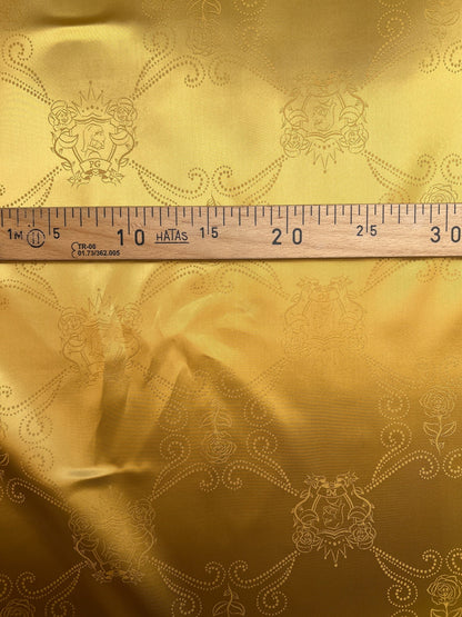Włoska tkanina żakardowa z wiskozy w złotym odcieniu – 100 g/m²
