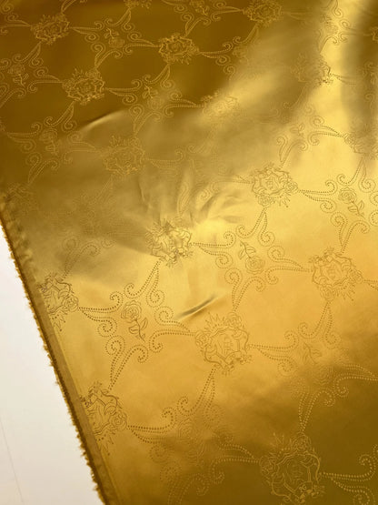 Włoska tkanina żakardowa z wiskozy w złotym odcieniu – 100 g/m²