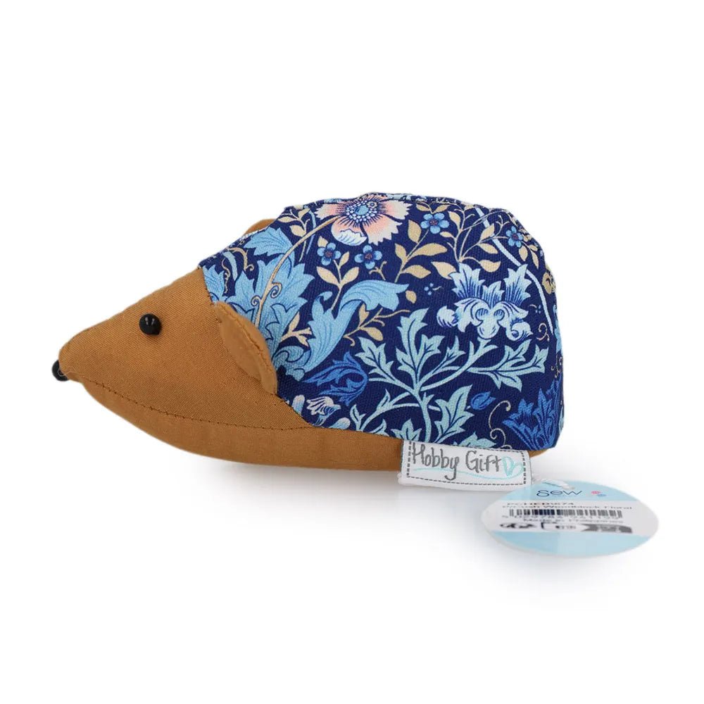 Image of a hedgehog pin cushion with a floral pattern by Hobby Gift – available at Šarlotes audumi