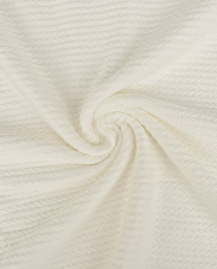 Image of knitted jacquard fabric with braids - warm white 350 g/m² – available at Šarlotes audumi