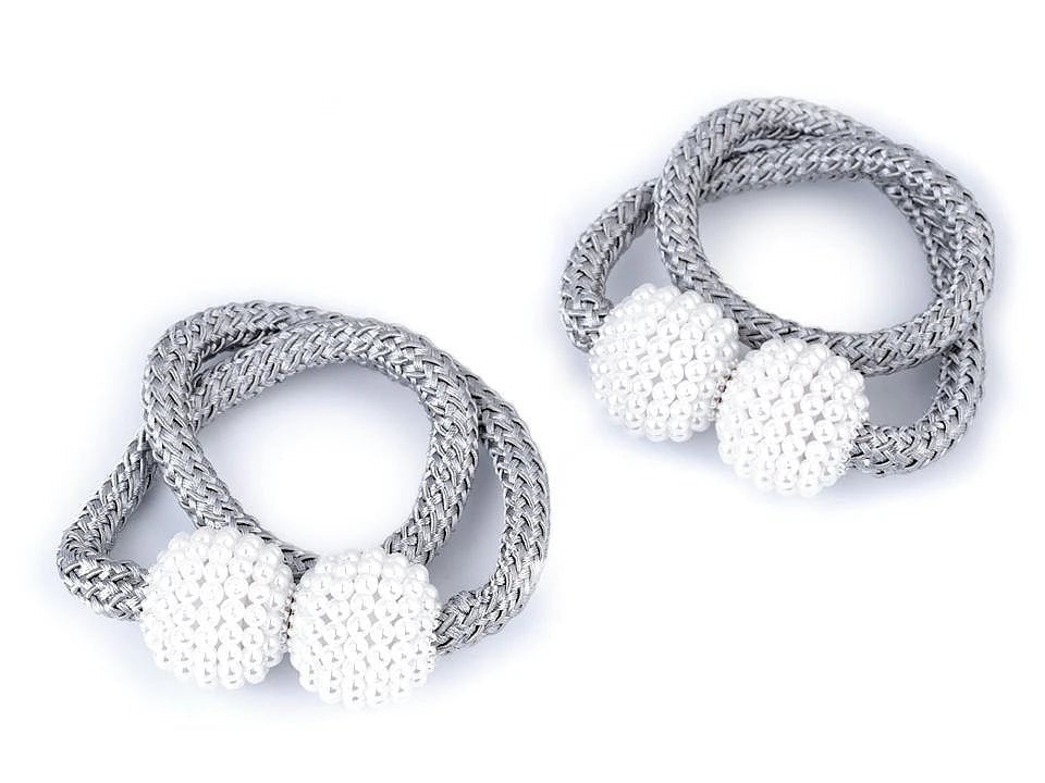 Image with magnetic curtain holders (2 pcs per set) | available in various shades – available at Charlotte Fabrics