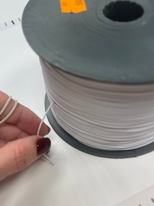 Image of round elastic cord 1 mm – white – available online at Šarlotes audumi