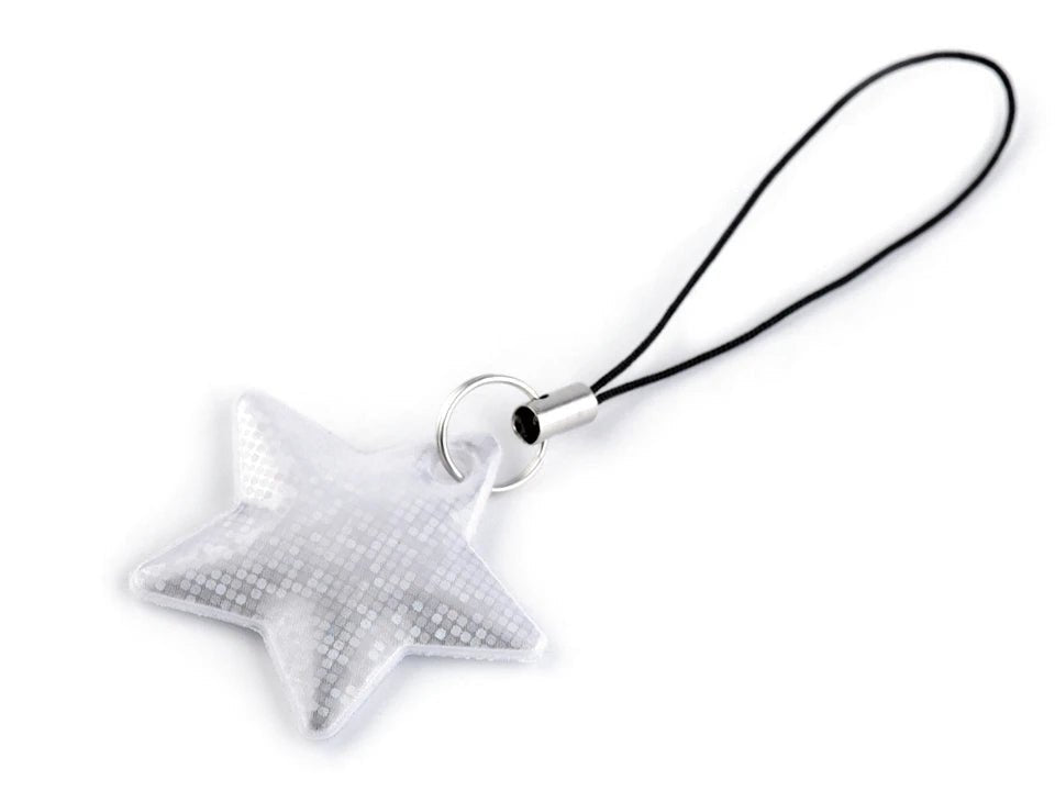 Image with Reflective star|different shades – available at Charlotte's Fabrics