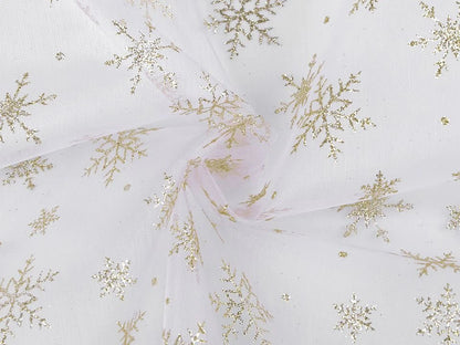 White organza with gold glitter snowflakes – available online at Šarlotes audumi