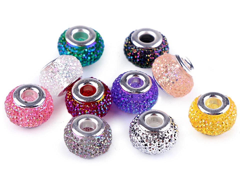 Image with “Charm” beads with a metallic effect | 9 × 14 mm 10 pcs | assorted colors – available at Charlotte’s Fabrics