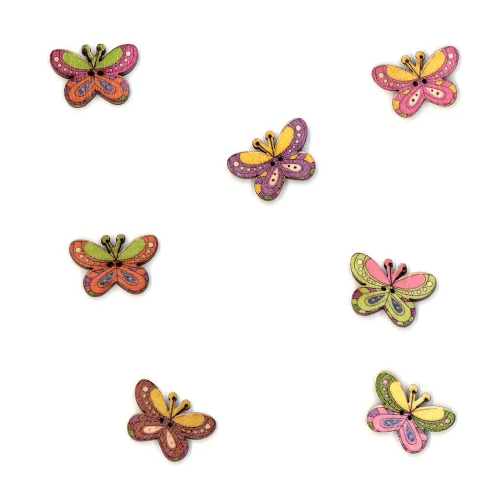 Image of a decorative butterfly-shaped wooden button – 25 mm – available online at Šarlotes audumi