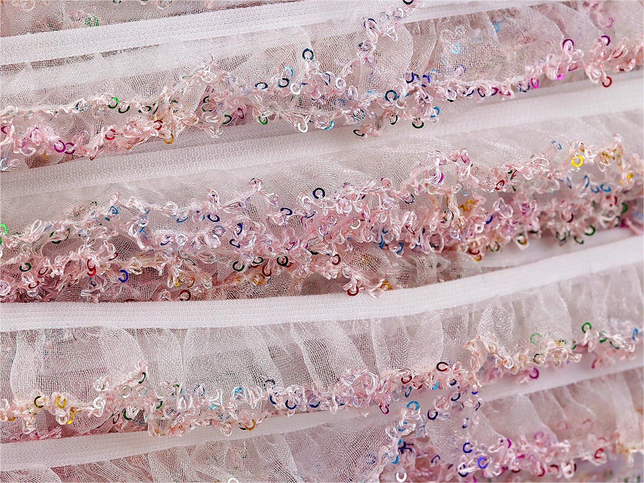Image of decorative ruffled elastic lace with sequins 20 mm – available online at Šarlotes audumi