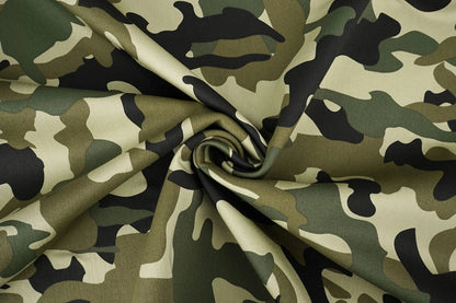 Image of denim fabric with camouflage pattern – Army Green 275 g/m² – available at Šarlotes Audumi