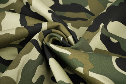 Image of denim fabric with camouflage pattern – Army Green 275 g/m² – available at Šarlotes audumi