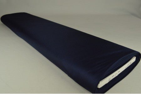 Image with flexible knitted lining - dark blue 75 g/m² – available at Charlotte's fabrics