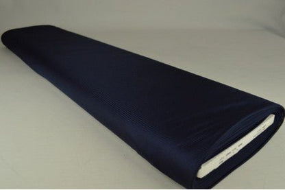 Image with flexible knitted lining - dark blue 75 g/m² – available at Charlotte's fabrics