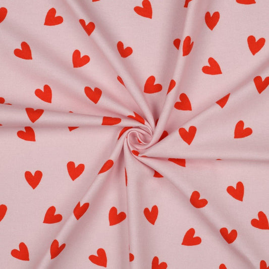 Image with Flannel - red hearts on pink 165 g/m² – available at Charlotte’s Fabrics
