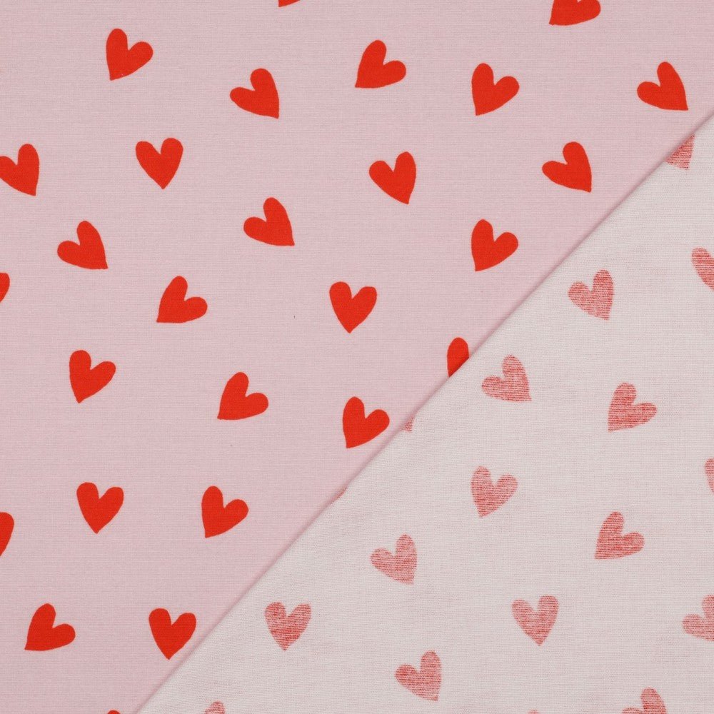 Image of flannel - red hearts on pink 165 g/m² – available at Šarlotes audumi