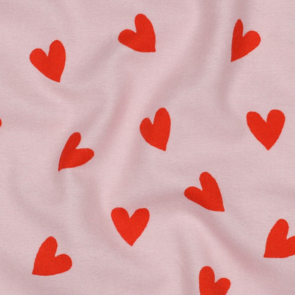 Image of flannel - red hearts on pink 165 g/m² – available at Charlotte's Fabrics