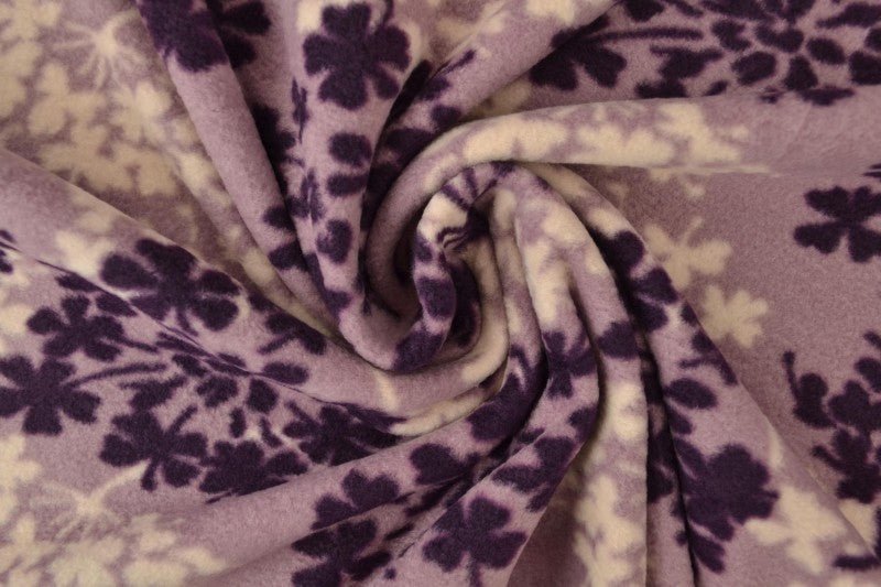 Image of fleece fabric with tree pattern – purple/beige – available online Šarlotes audumi