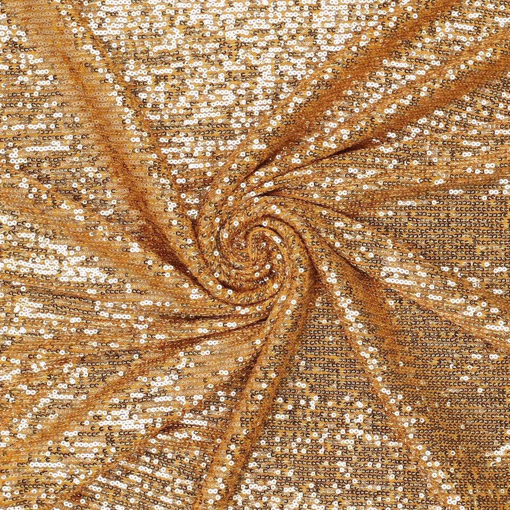 Image with sequin fabric - gold 285 g/m² – available at Šarlotes audumi