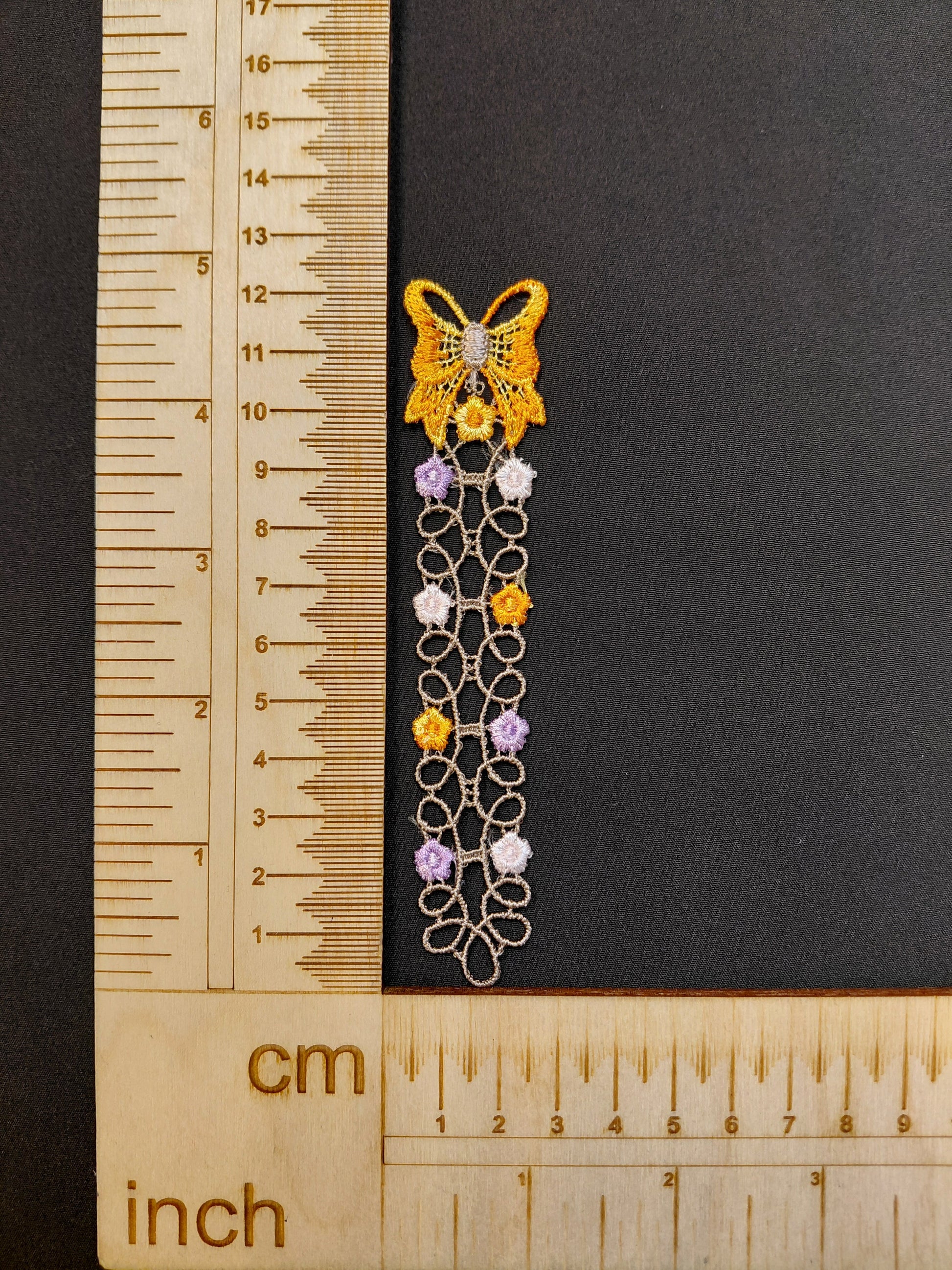Image with patch/embroidery 12 x 2 cm – available at Šarlotes audumi