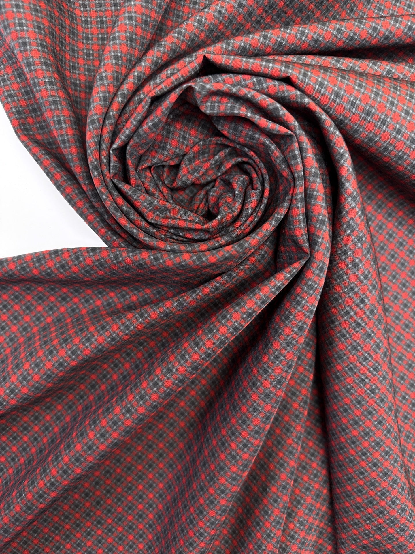 Image of Italian 100% viscose fabric in a red-gray pattern – available online at Charlotte's Fabrics