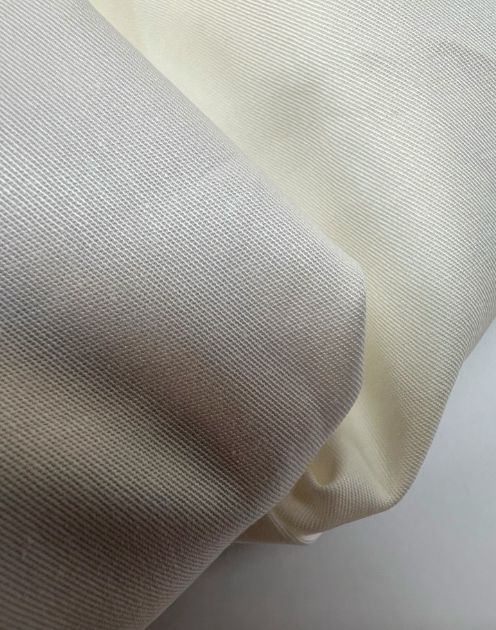 Image of Italian cotton and elastane fabric, butter white, 150 g/m2 – available at Šarlotes audumi