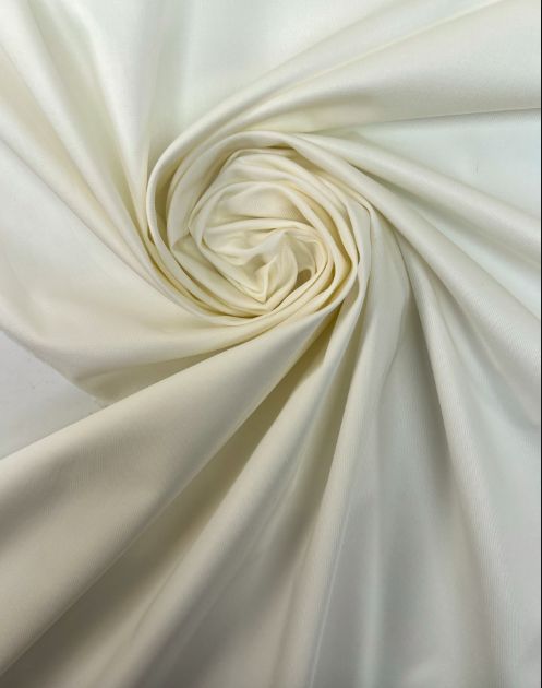 Image with Italian cotton and elastane fabric, butter white, 150 g/m2 – available at Šarlotes audumi
