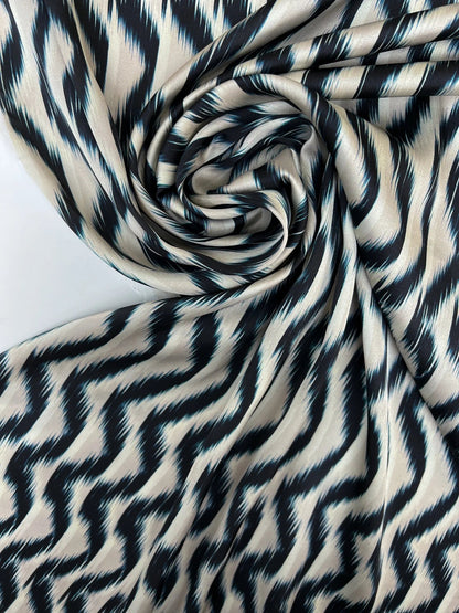 Image of Italian satin fabric, beige-blue with an abstract pattern, 85 g/m2 – available at Šarlotes audumi